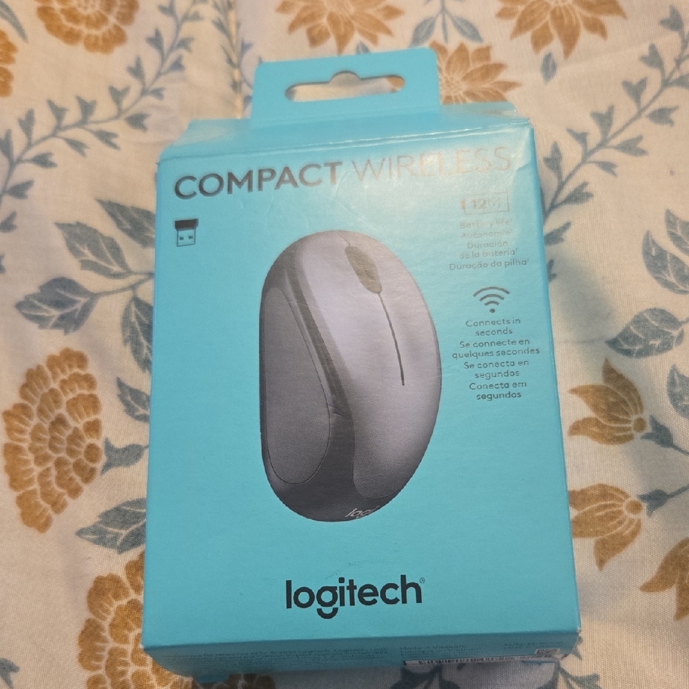 Logitech Compact Wireless Mouse - Silver and Blue